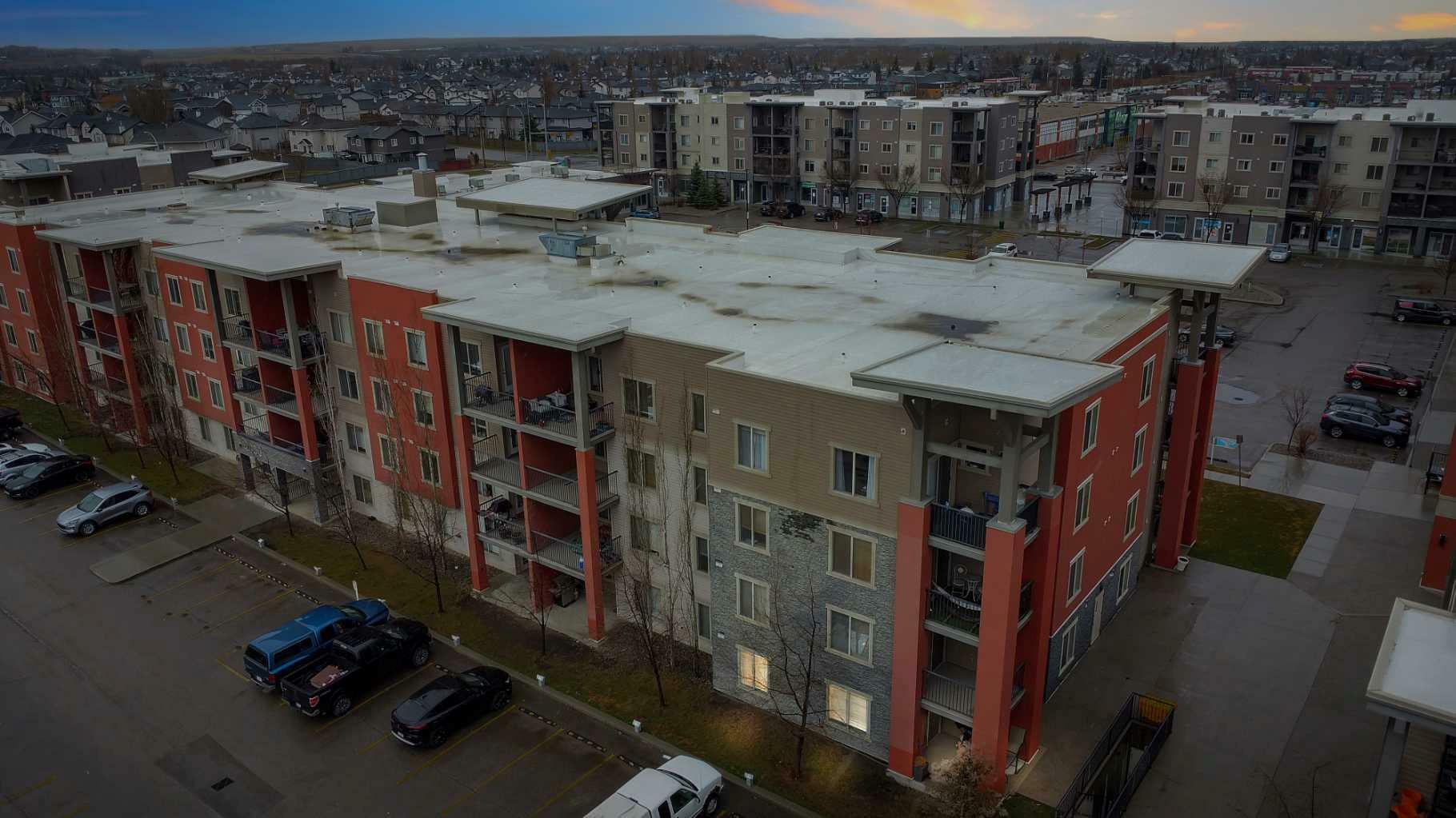 Property Photo: 403 Mackenzie Way SW 2106 AB T4B 3V7