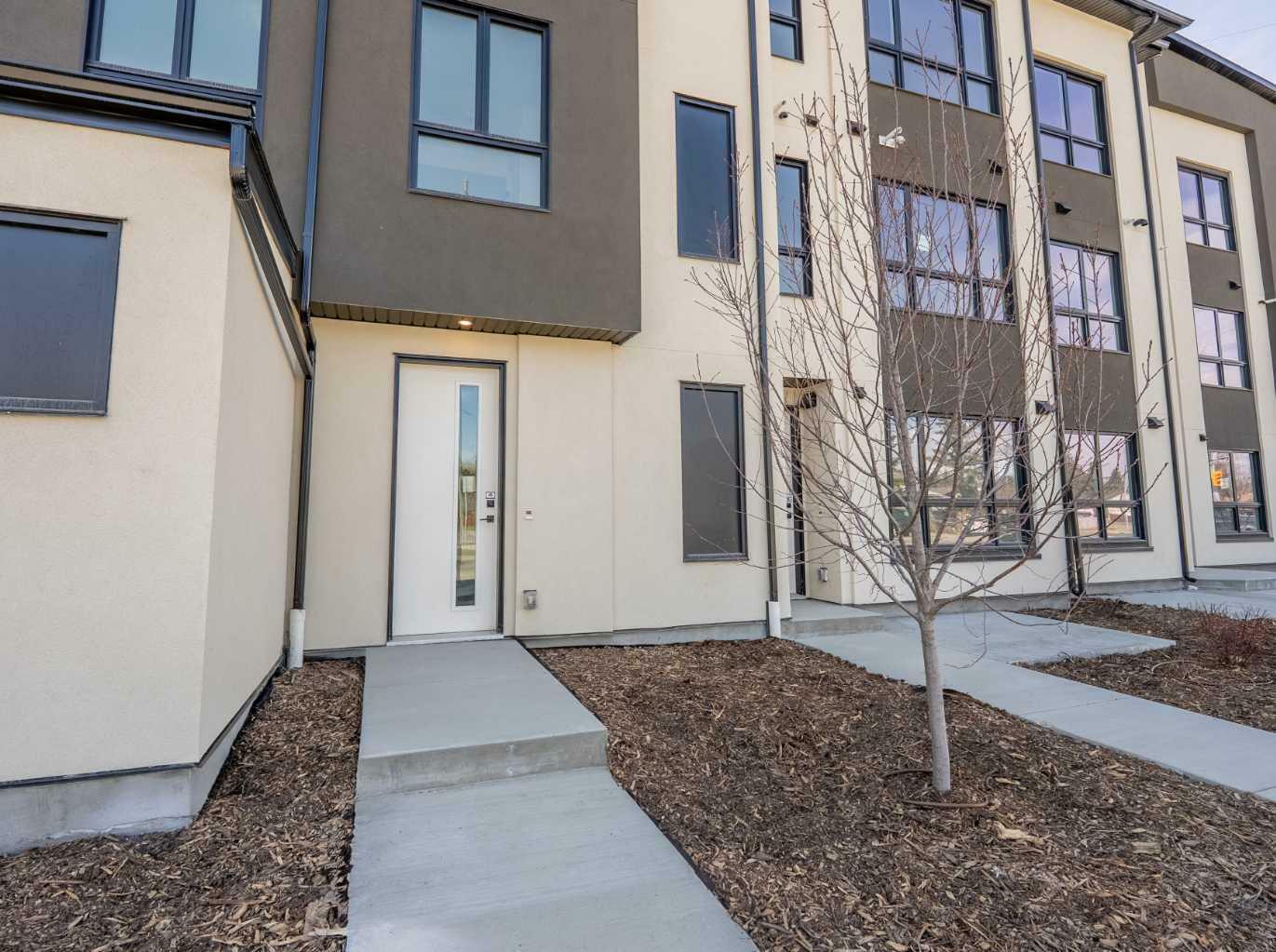 Property Photo: 4903 Bowness Road NW AB T3B 1H1