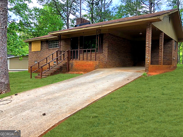 Property Photo:  7225 Pineneedle Drive SW  GA 30014 
