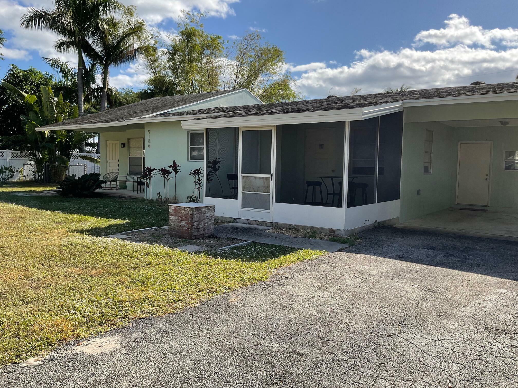 Property Photo: 9186 SE Venus Street FL 33455