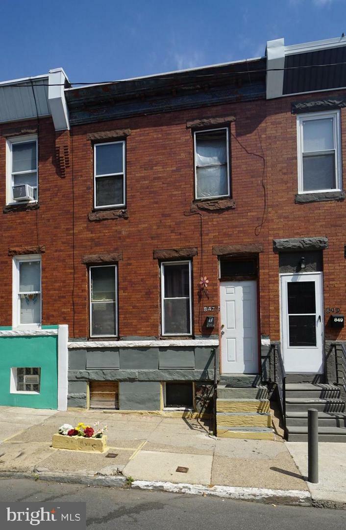 Property Photo: 847 E Thayer Street PA 19134