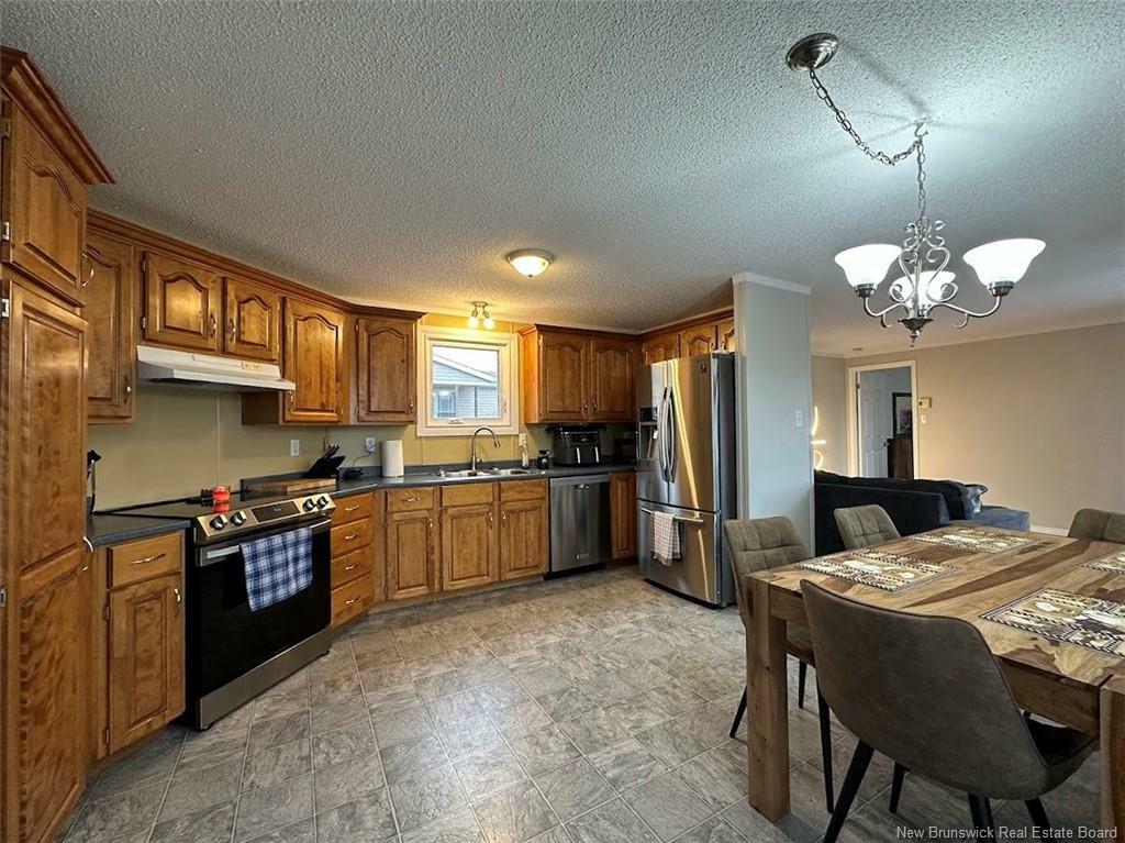 Property Photo: 60 Cardinal Street NB E3V 5E4