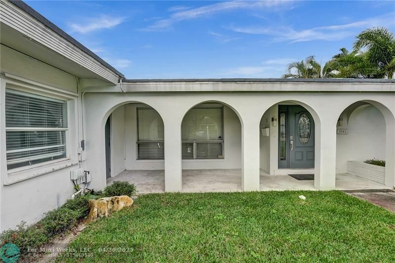 Property Photo: 5981 NE 22nd Way FL 33308