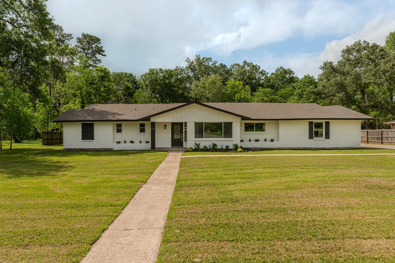 Property Photo:  319 Pinemont Dr  TX 77659 