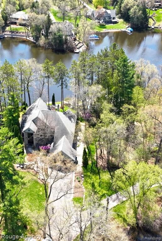 Property Photo:  1151 Abseguami Trail  MI 48362 1408 