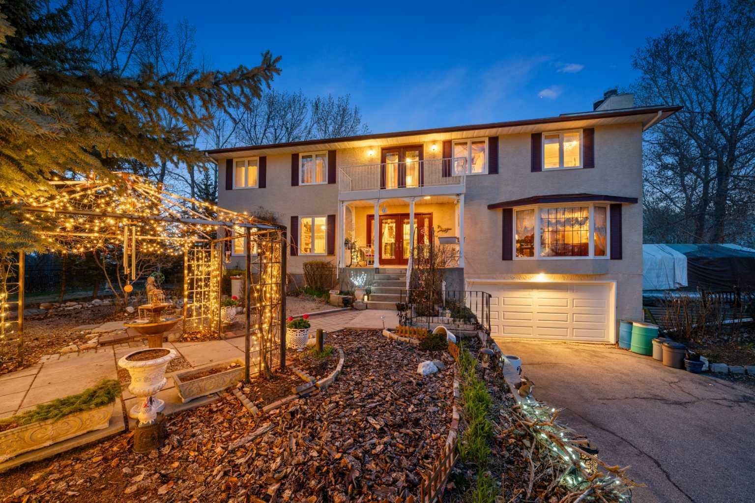 Property Photo: 322136 8 Street E AB T1S 3L7