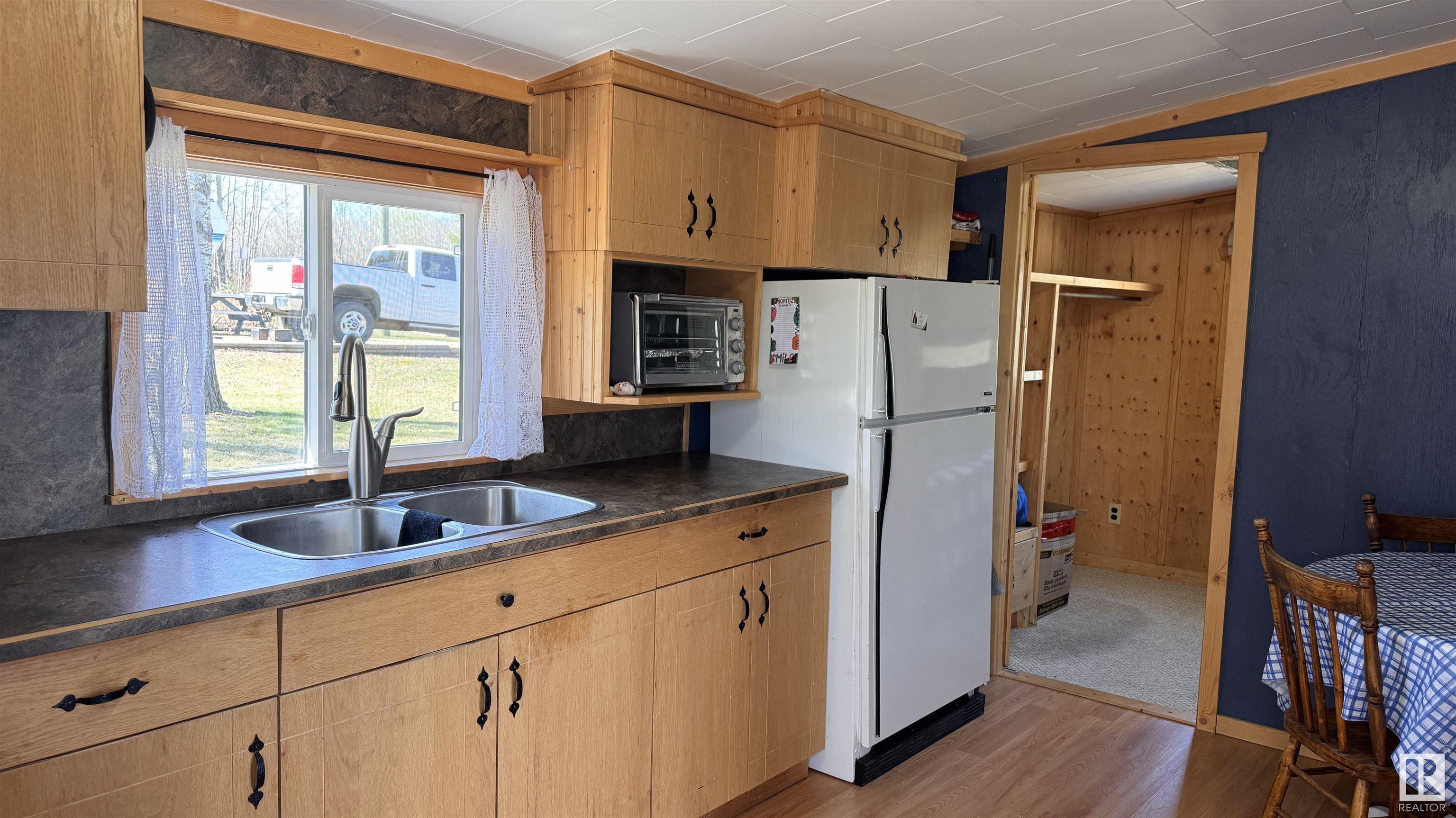 Property Photo: 310, 11121 Twp Rd 595 AB T0A 0C0