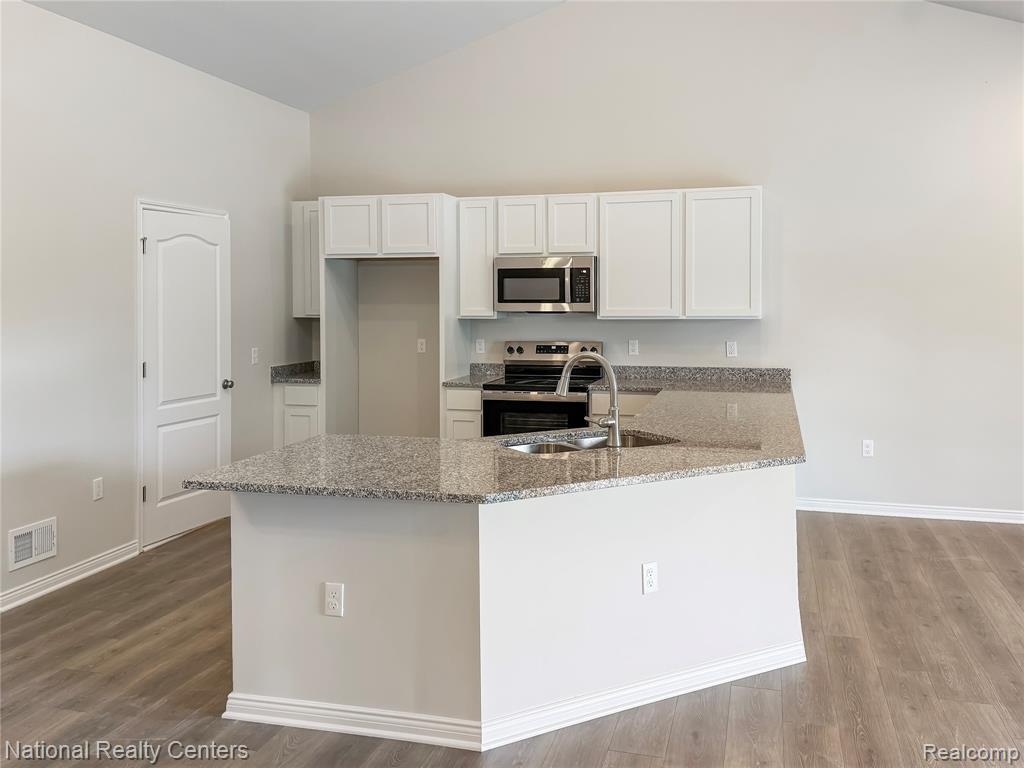 Property Photo: 305 Devonshire Drive 8 MI 48446 4798