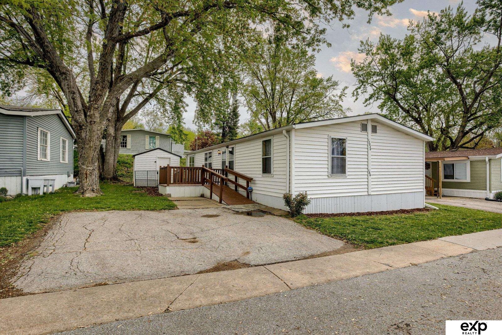 Property Photo:  12820 Spaulding Street 186  NE 68164 