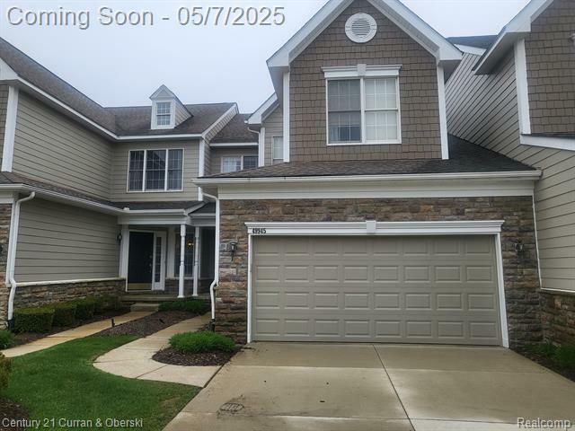 Property Photo: 49945 Streamwood Drive Unit #74 MI 48374
