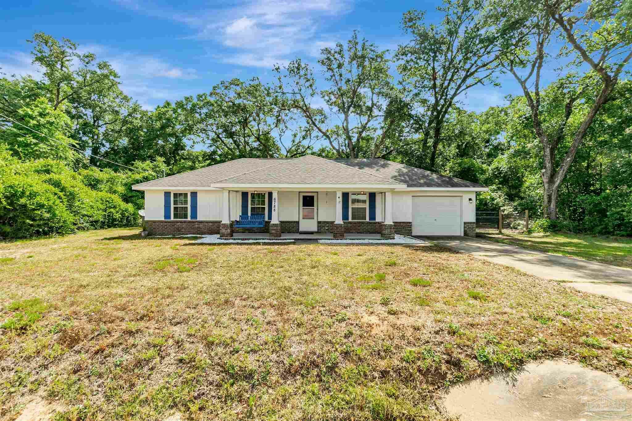 Property Photo: 6788 Contentment St FL 32583