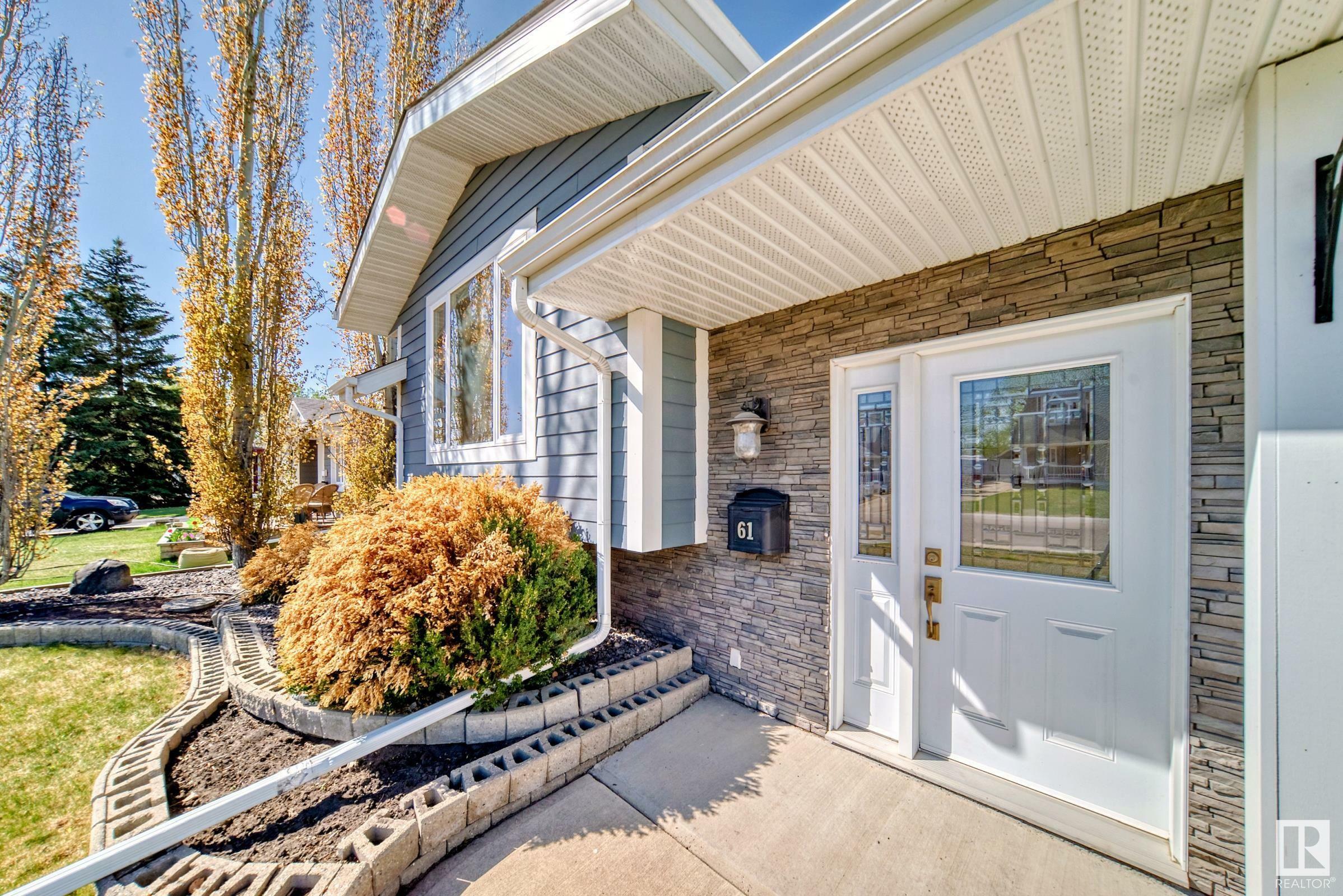 Property Photo: 61 Woodbine Road AB T8A 4A7