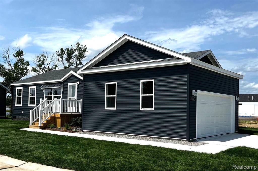 Property Photo:  202 Riviera Drive  MI 48446 