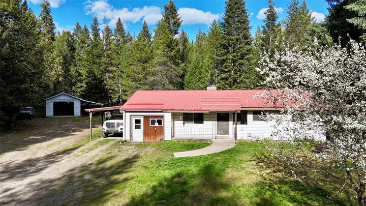 Property Photo:  12437 US Highway 2  MT 59935 