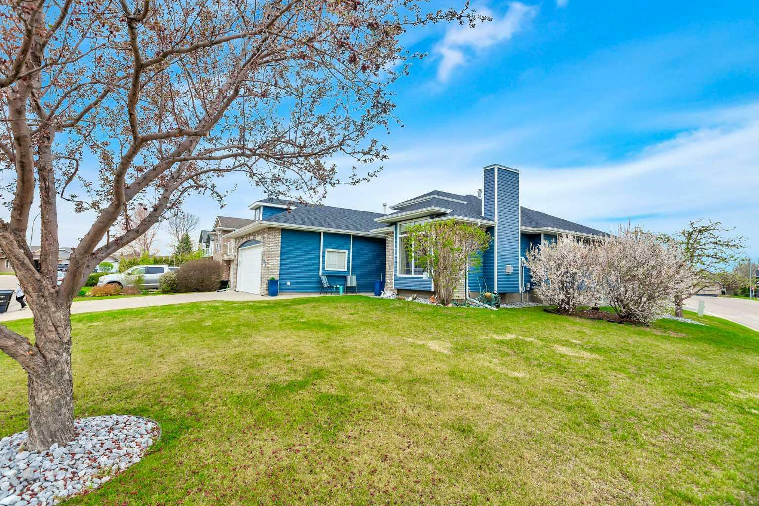 Property Photo: 15 Lakes Close AB T4L 1S5