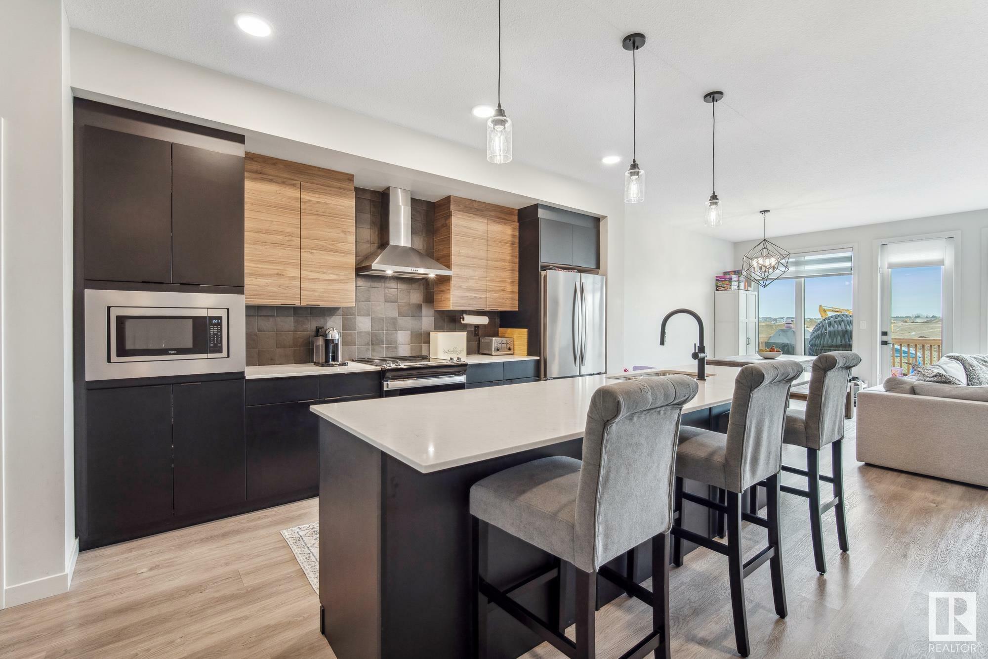 Property Photo: 9192 Pear Drive SW AB T6X 2Z4