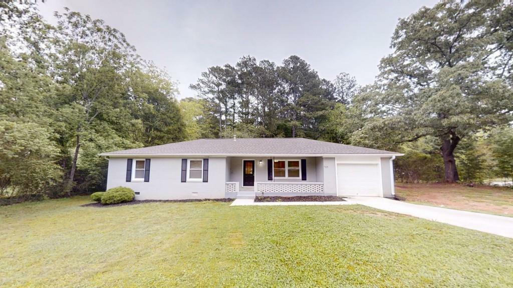 Property Photo: 7125 Puckett Street SW GA 30014