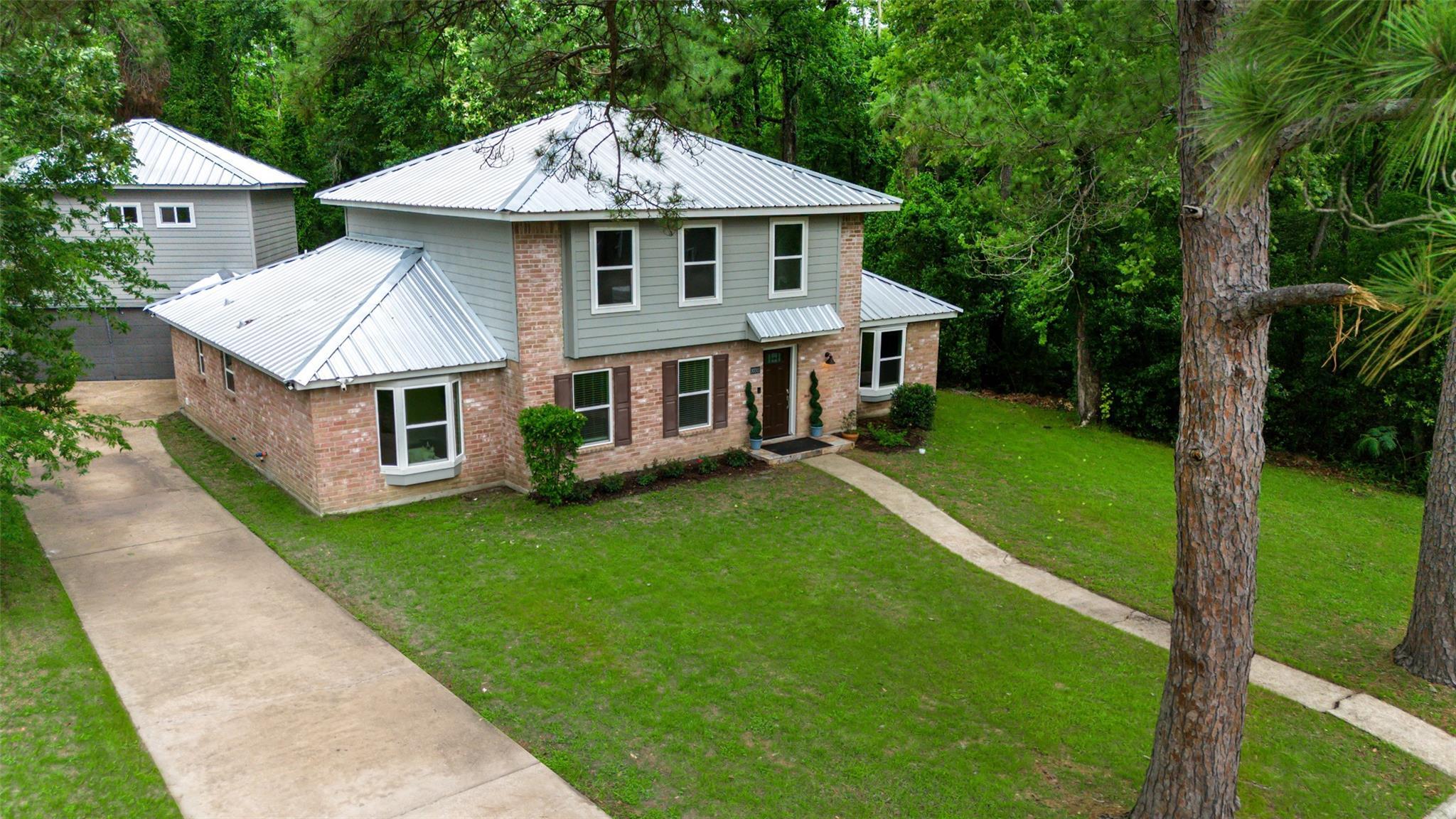 Property Photo:  10311 Woodhollow Drive  TX 77385 
