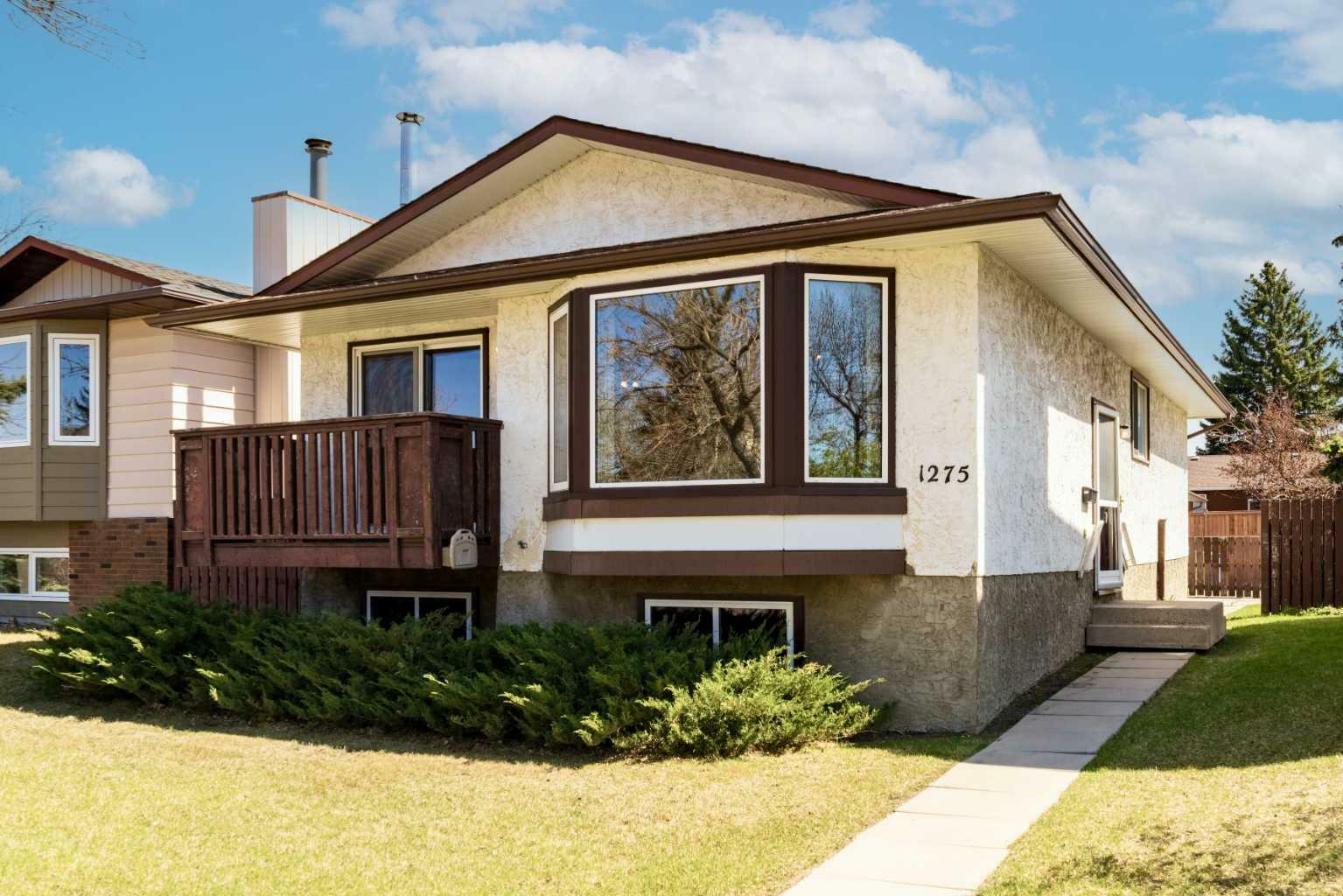Property Photo: 1275 Berkley Drive NW AB T3K 1T2