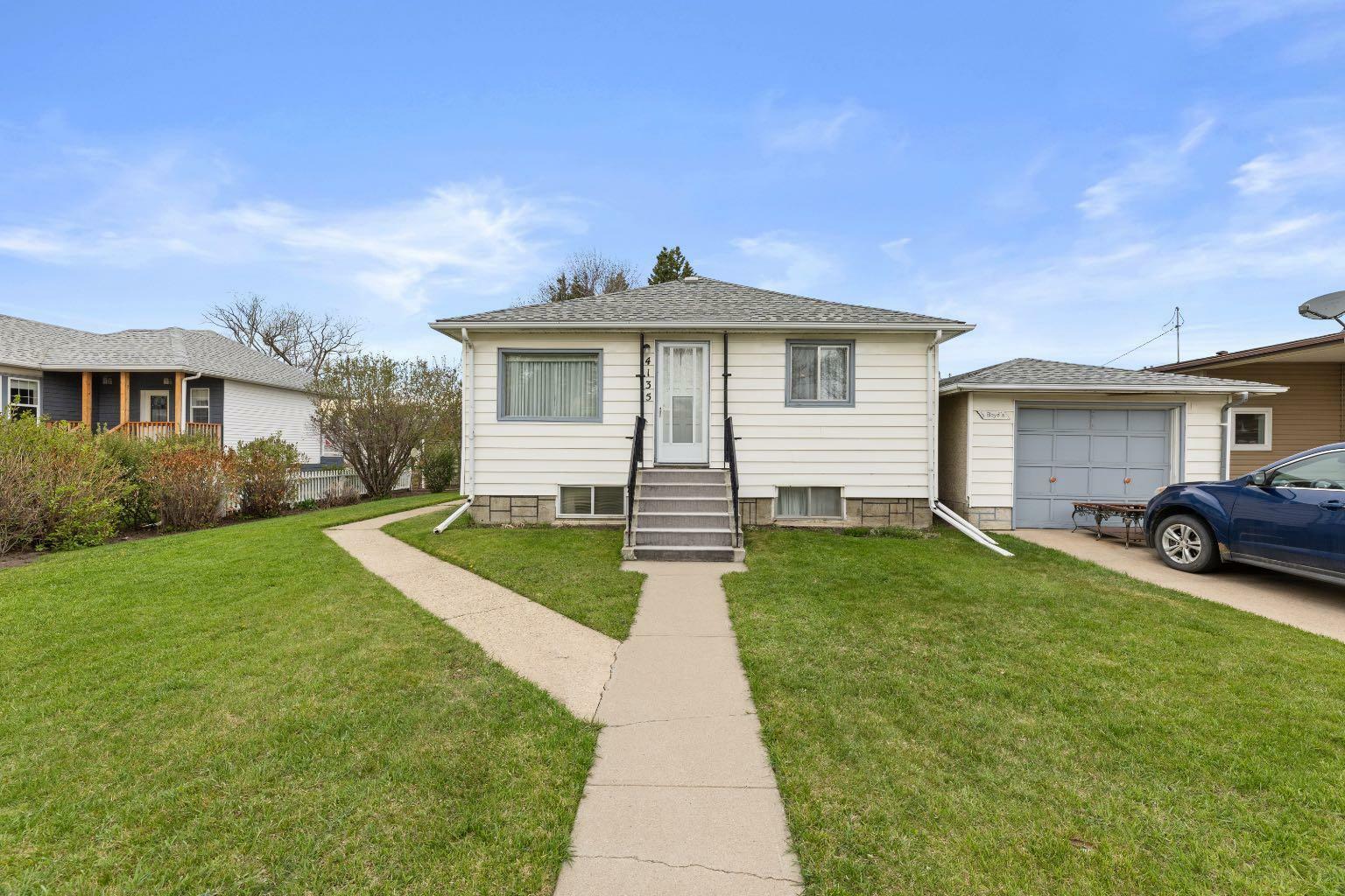 Property Photo: 4135 48 Avenue AB T4G 1K1
