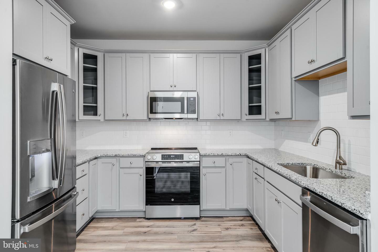 Property Photo:  4003 Seaside Alder Road 0101 - Daisey  MD 20720 