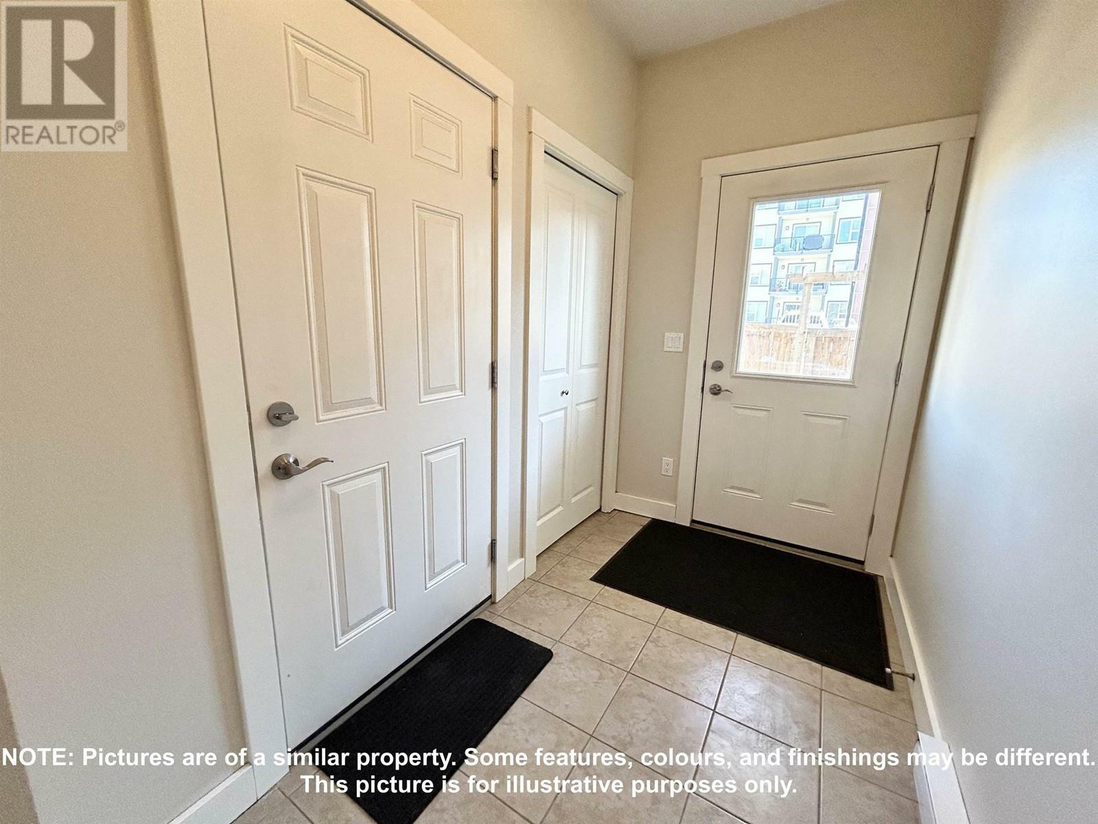 Property Photo: 10303 112 Street 103 BC V1J 0N6