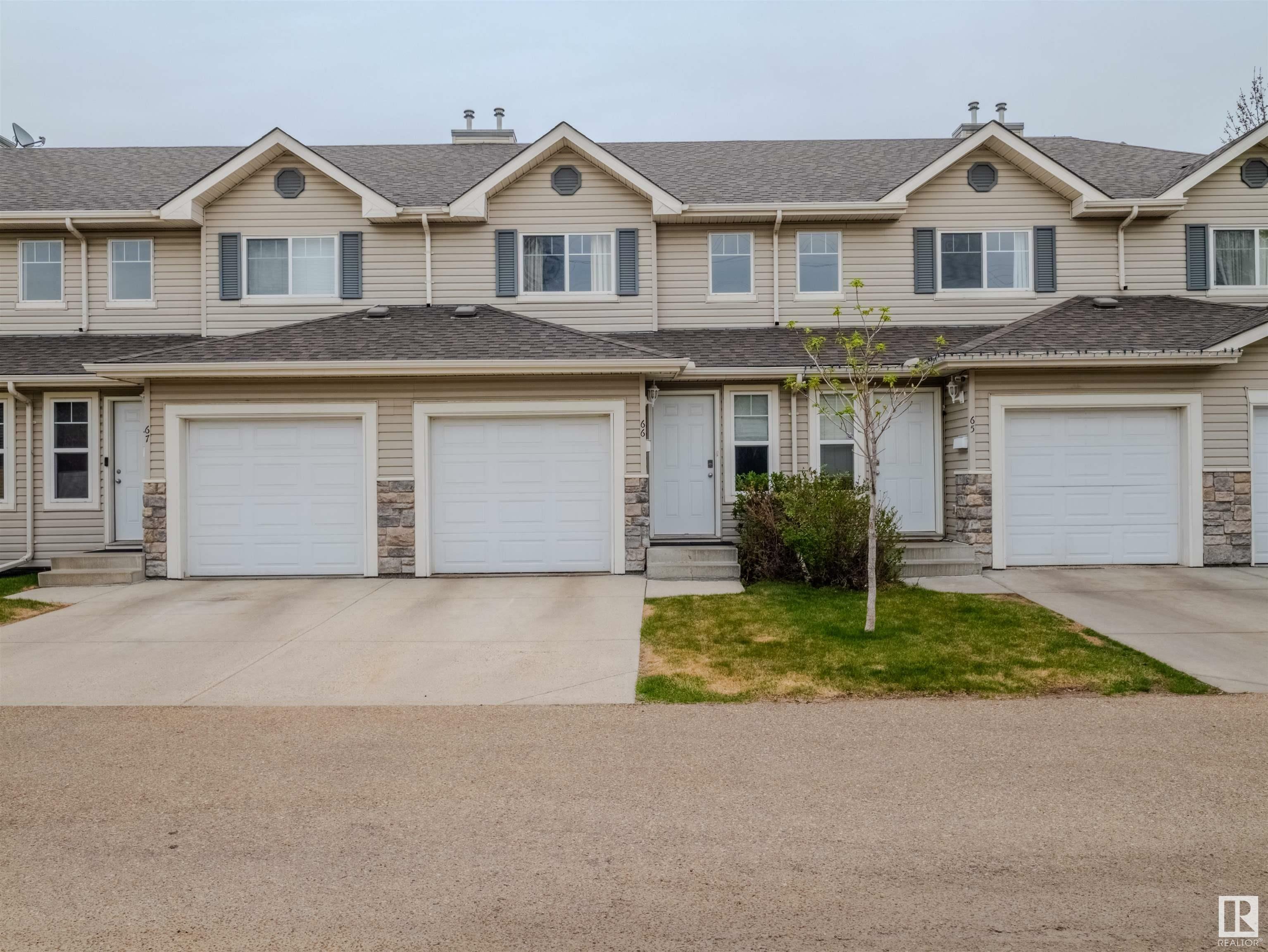 Property Photo: 230 Edwards Drive SW 66 AB T6X 1G7