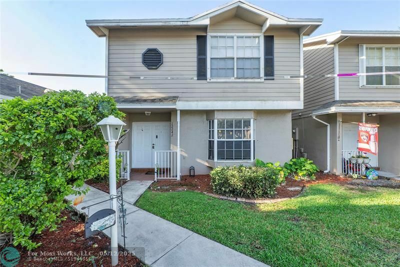 Property Photo: 12242 NW 36th Pl 12242 FL 33323