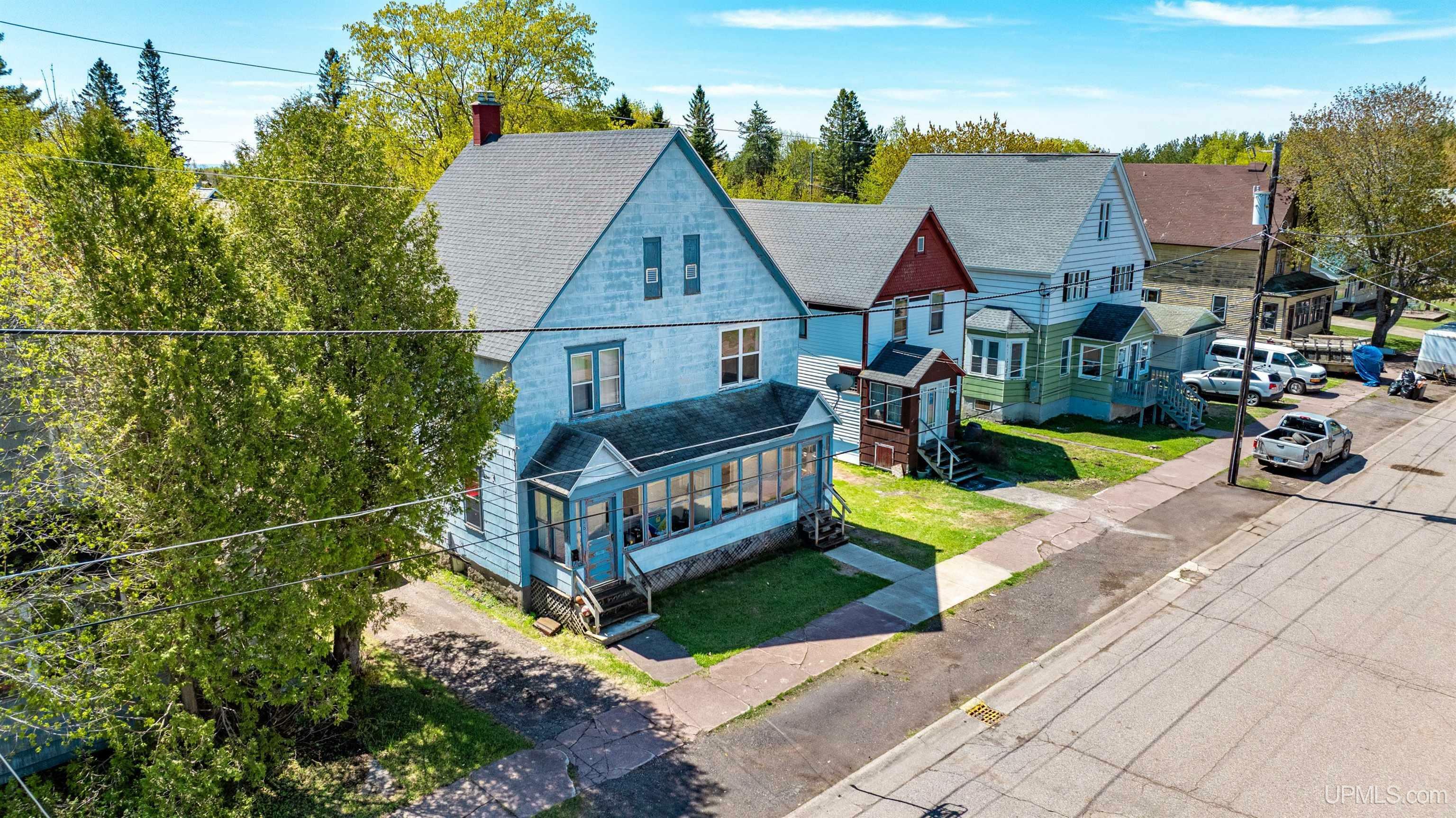 Property Photo:  118 S Tamarack Street  MI 49913 