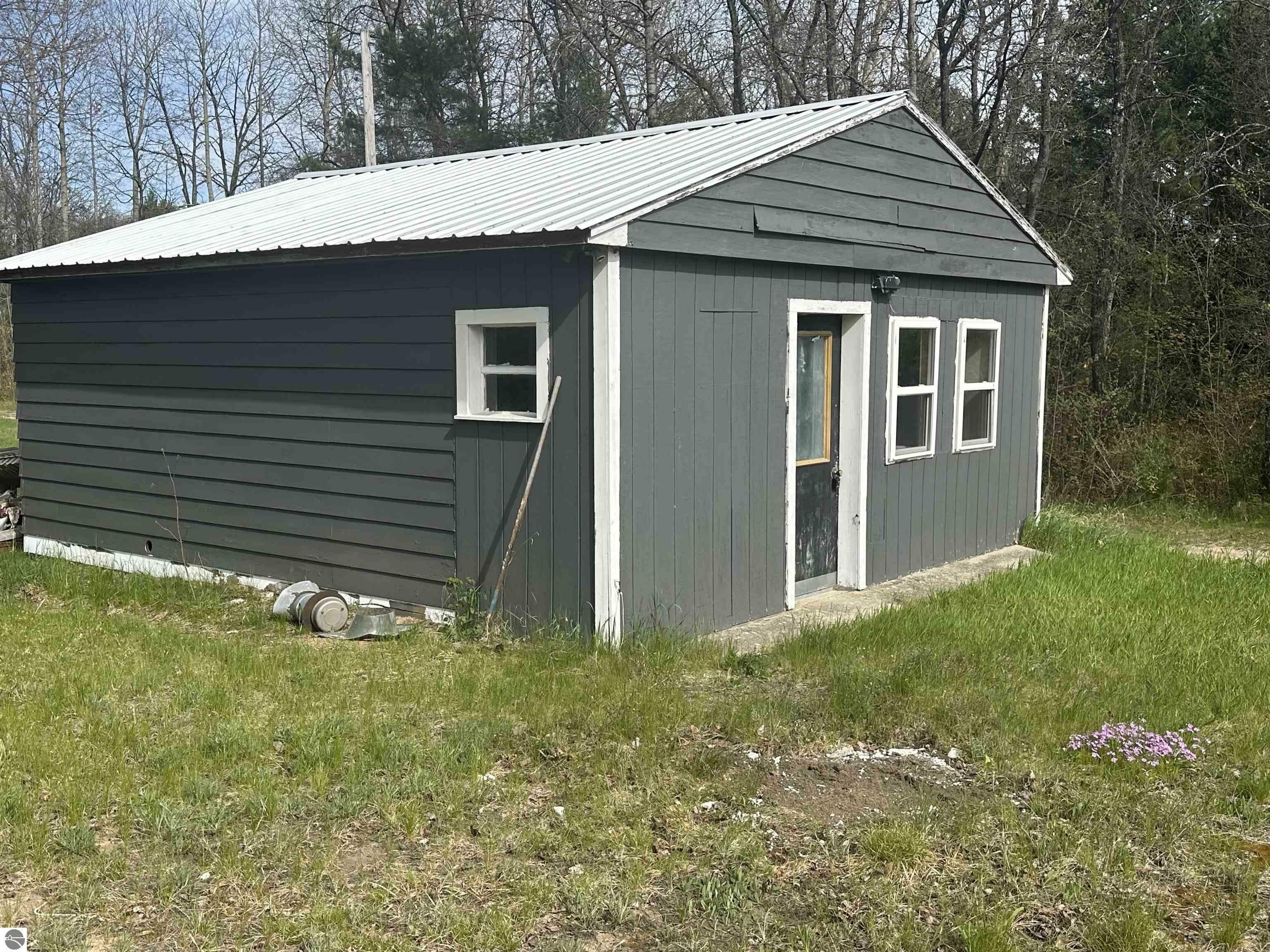 Property Photo:  13036 M-115  MI 49665 