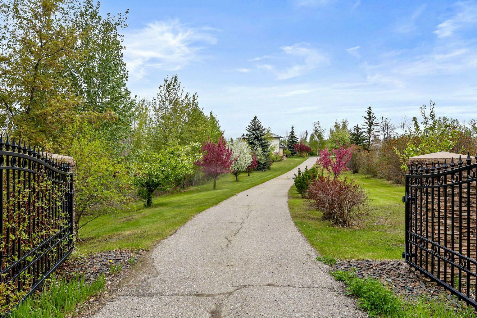 Property Photo: 243121 16 Street E 200 AB T1S 3L8