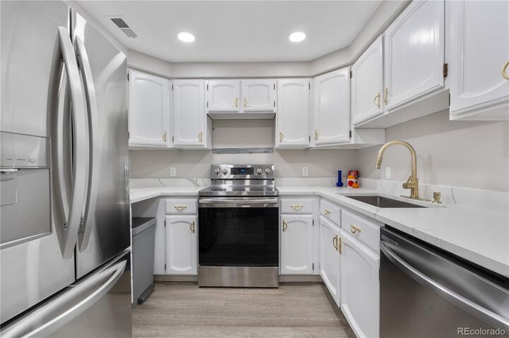 Property Photo:  701 Harlan Street E53  CO 80214 