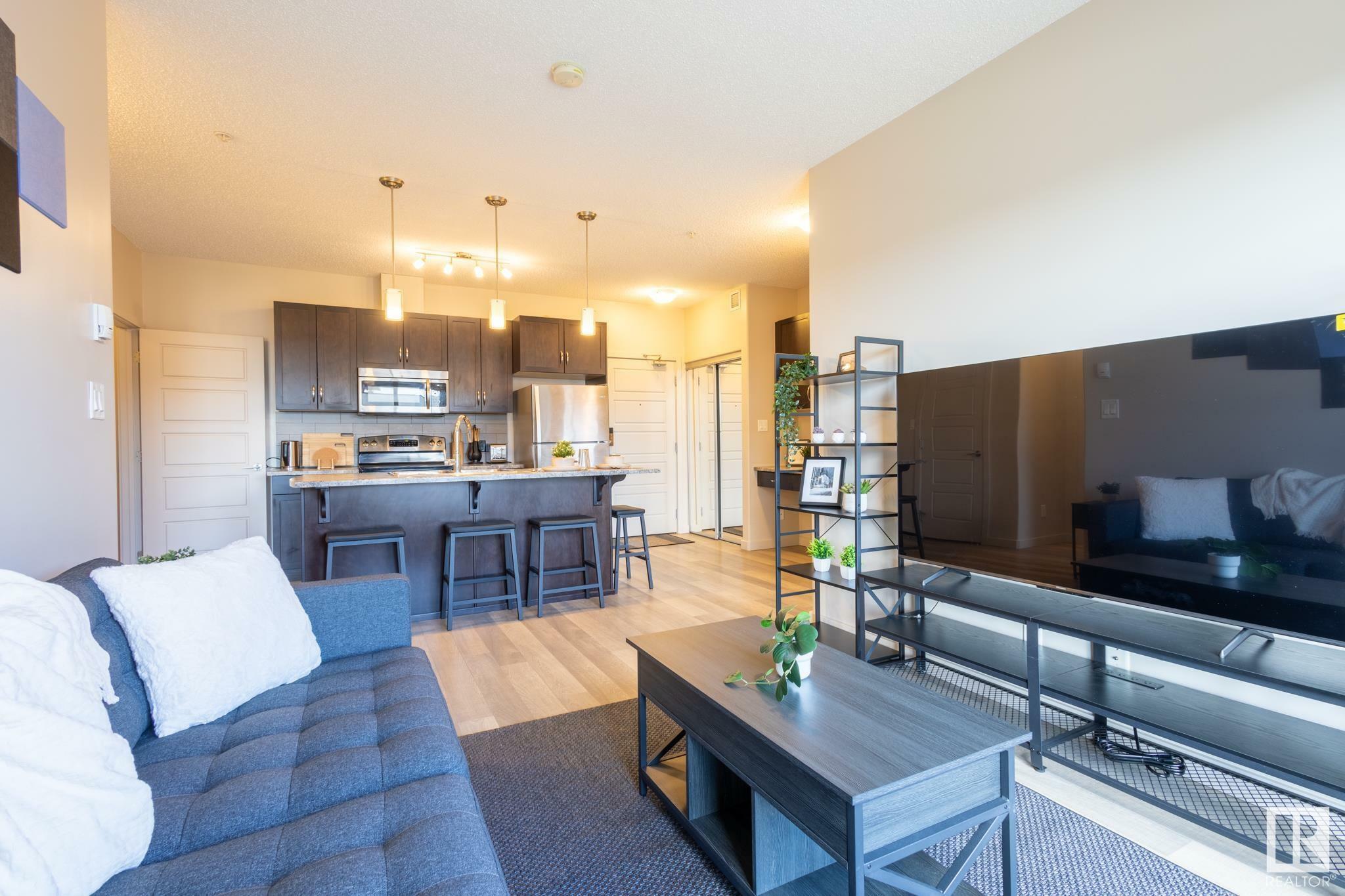 Property Photo:  320 Ambleside Link Link SW 403  AB T6W 2Z9 