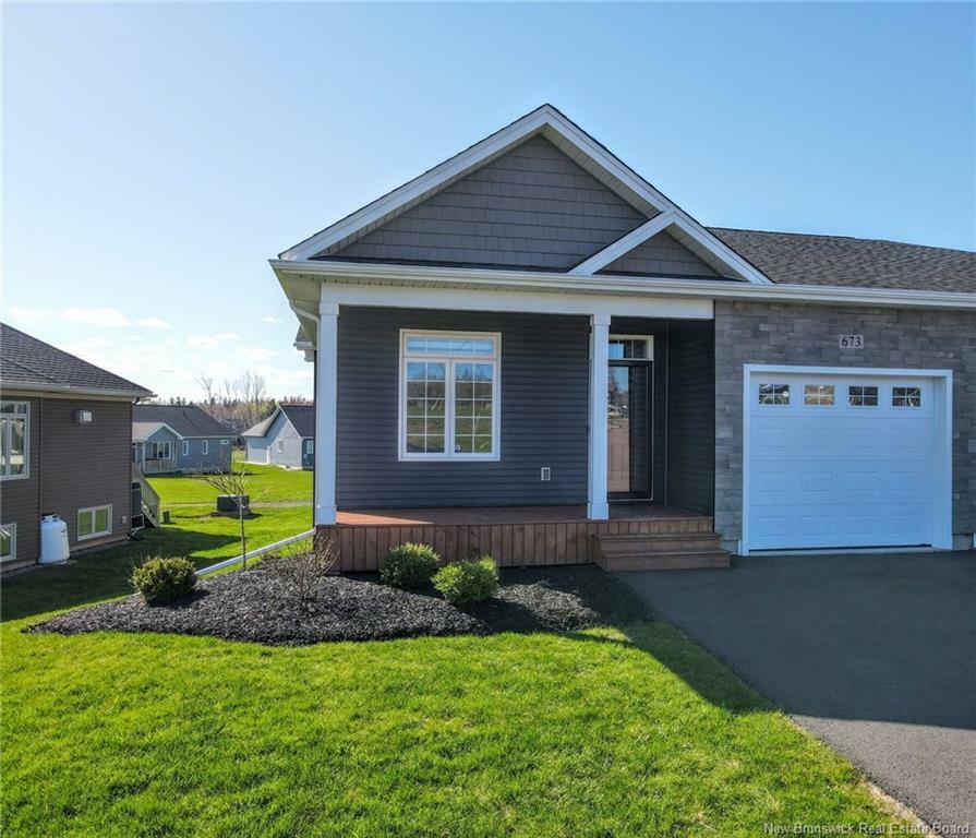 Property Photo: 673 Royal Oaks Boulevard NB E1H 0G2