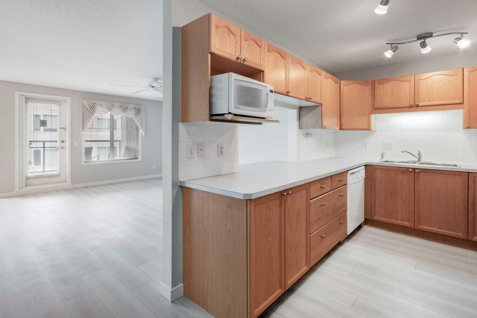 Property Photo: 928 Arbour Lake Road NW 1108 AB T3G 5T2