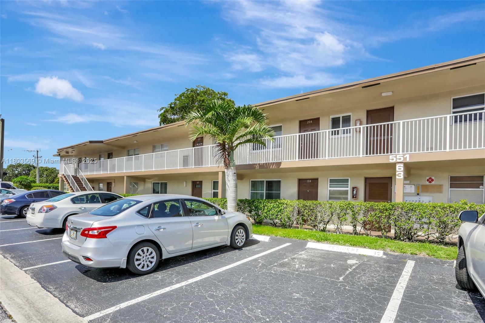 Property Photo:  551 NW 80th Ter 203  FL 33063 
