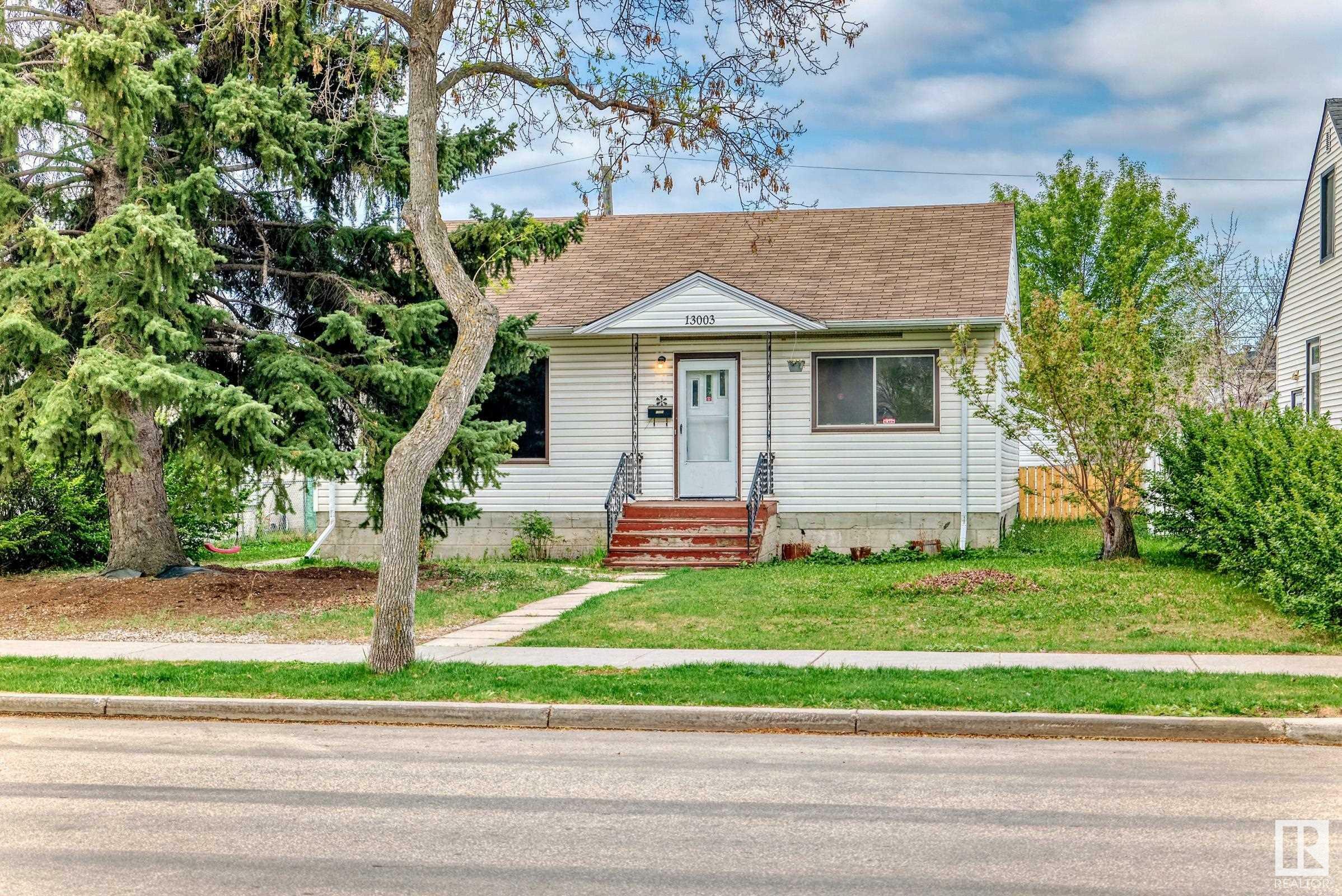 Property Photo: 13003 Sherbrooke Avenue NW AB T5L 4E6