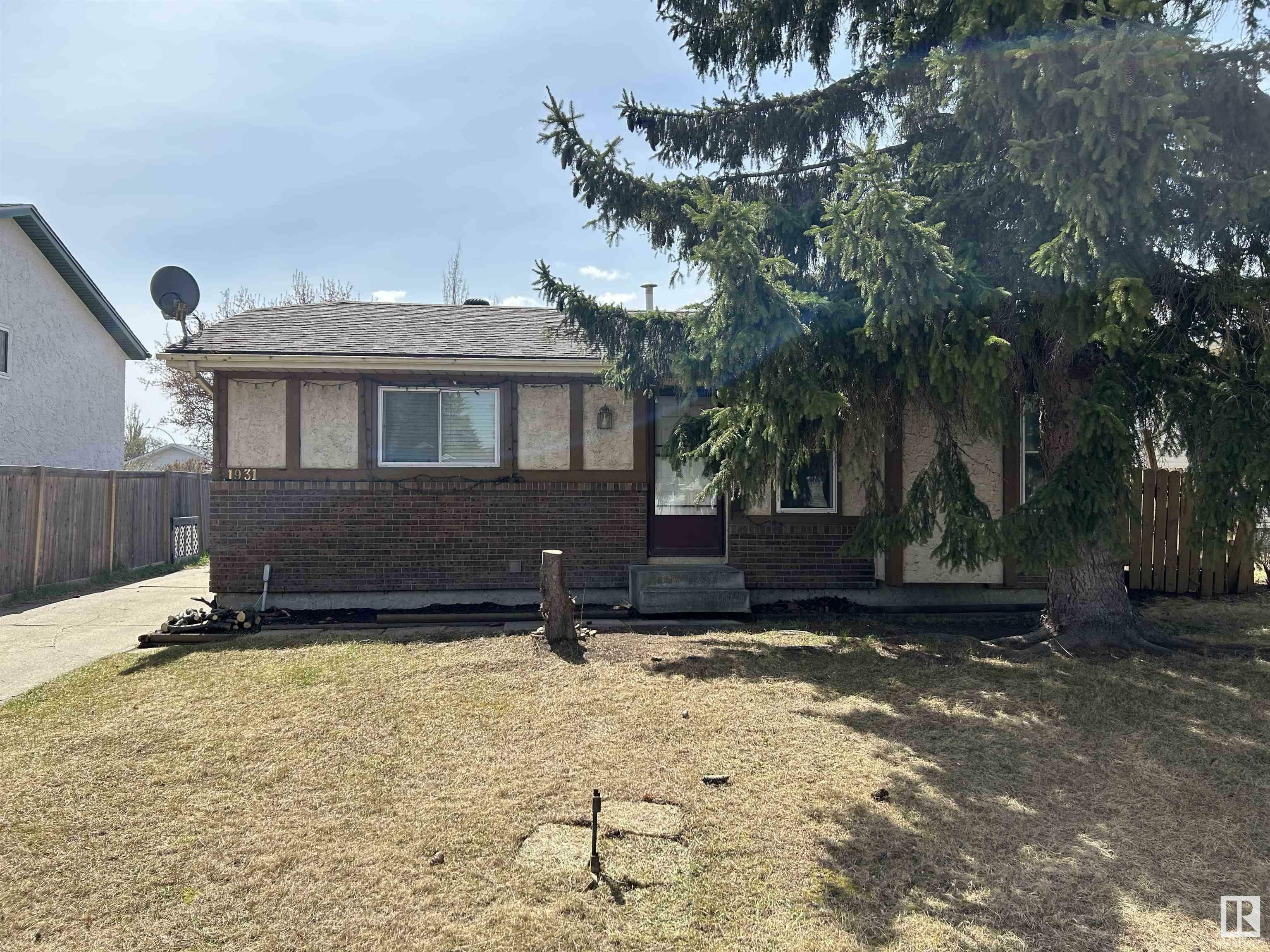 Property Photo: 1931 145A Avenue NW AB T5Y 1S9