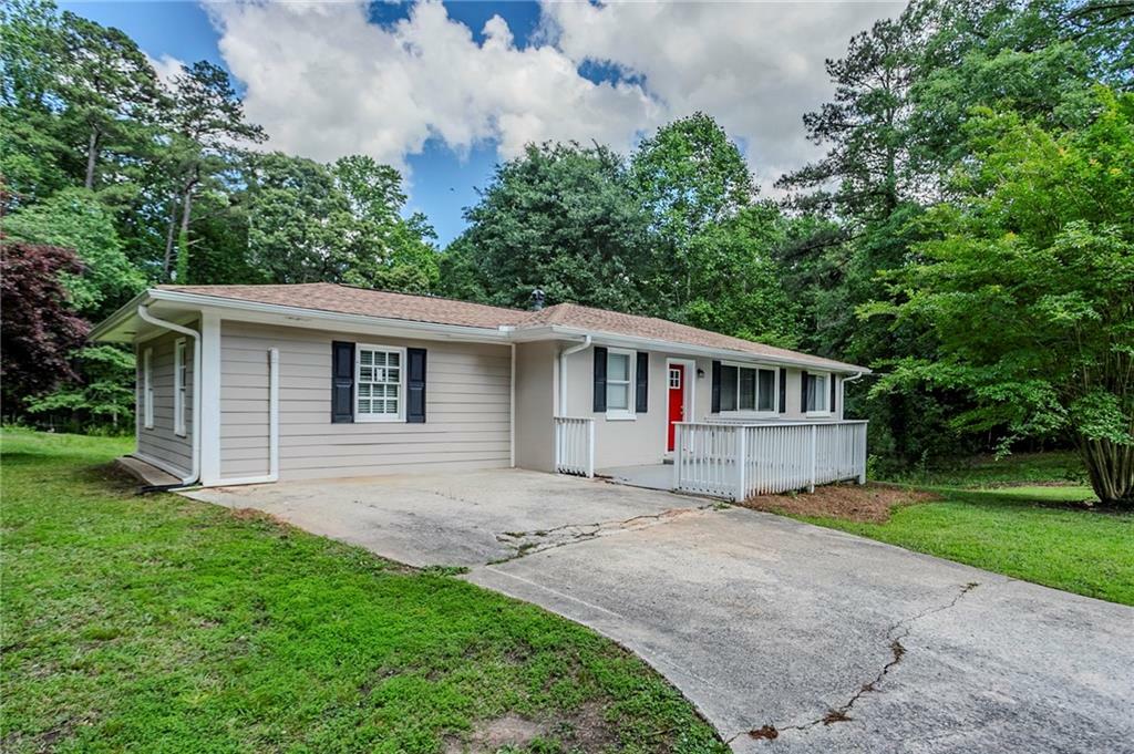 Property Photo:  3920 Stonewall Tell Road  GA 30349 