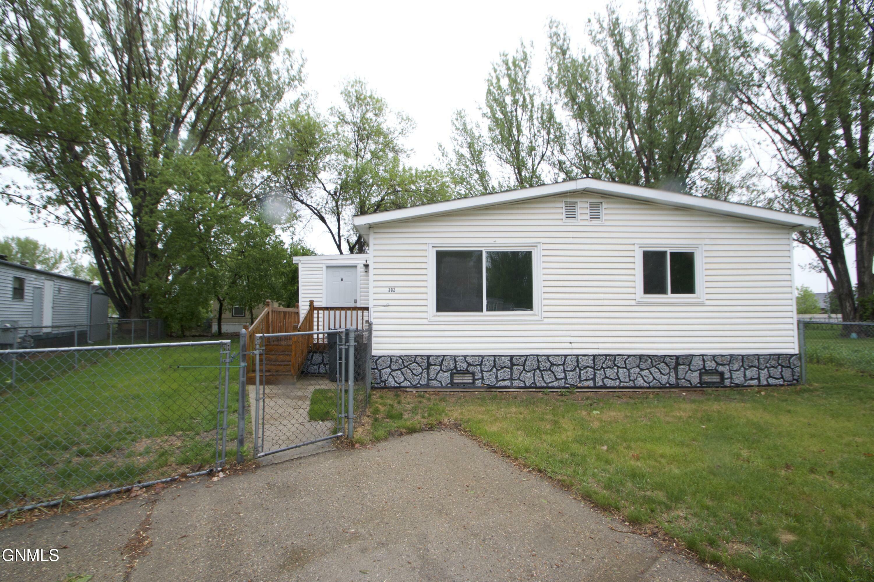 Property Photo: 302 Buckingham Place ND 58504