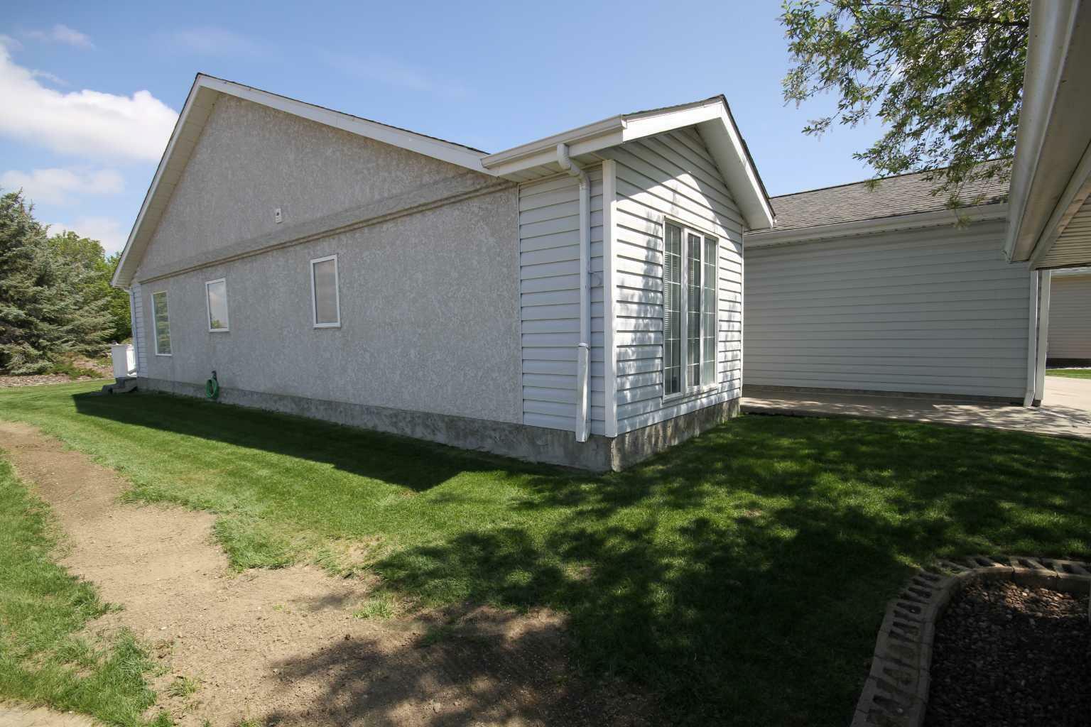 Photo de la propriété: 24 Fairway Village N AB T1G 1G2