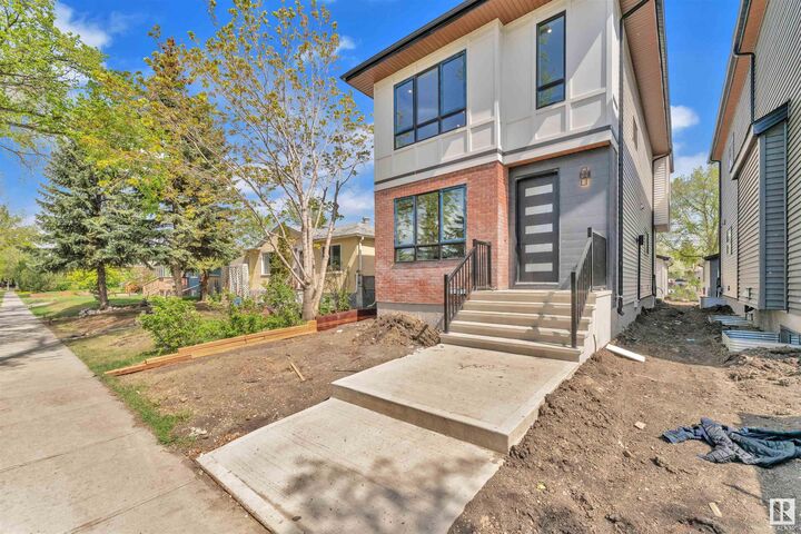 Property Photo:  10725 132 Street NW  AB T5M 1C8 