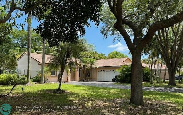 Property Photo:  4477 NW 65th St  FL 33073 