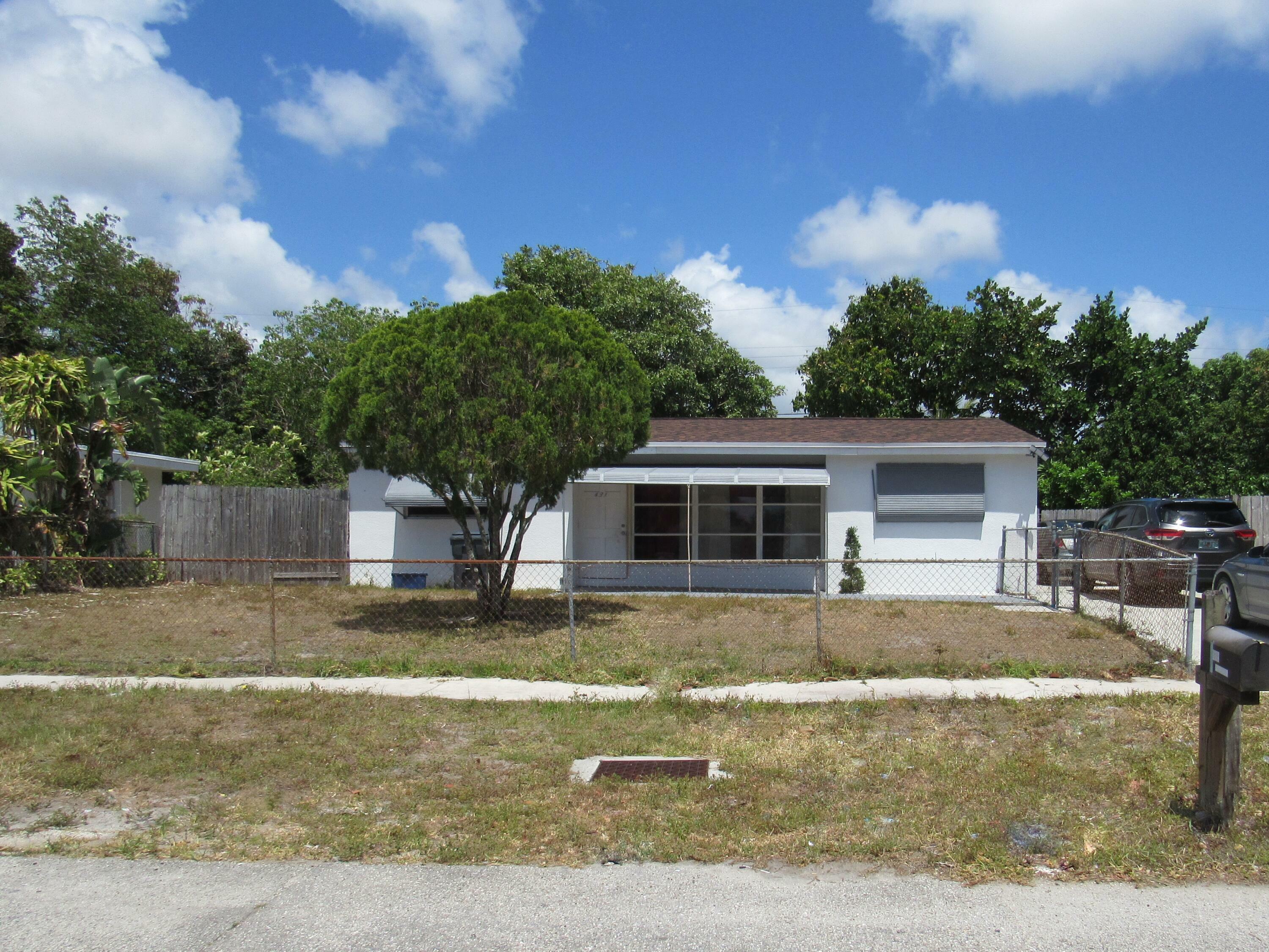 Property Photo: 431 Pensacola Drive FL 33462
