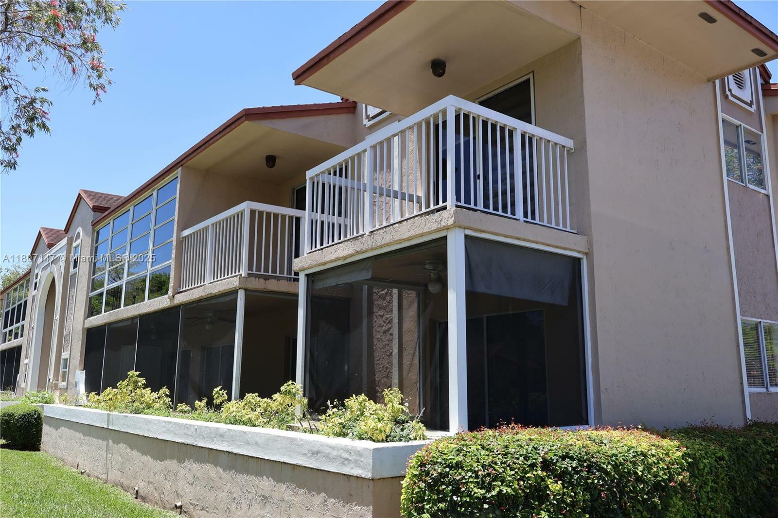 Property Photo: 4680 NW 102nd Ave 202-20 FL 33178