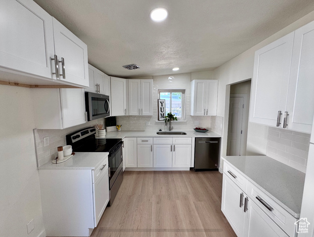 Property Photo: 5011 S Leisure Ln W UT 84129