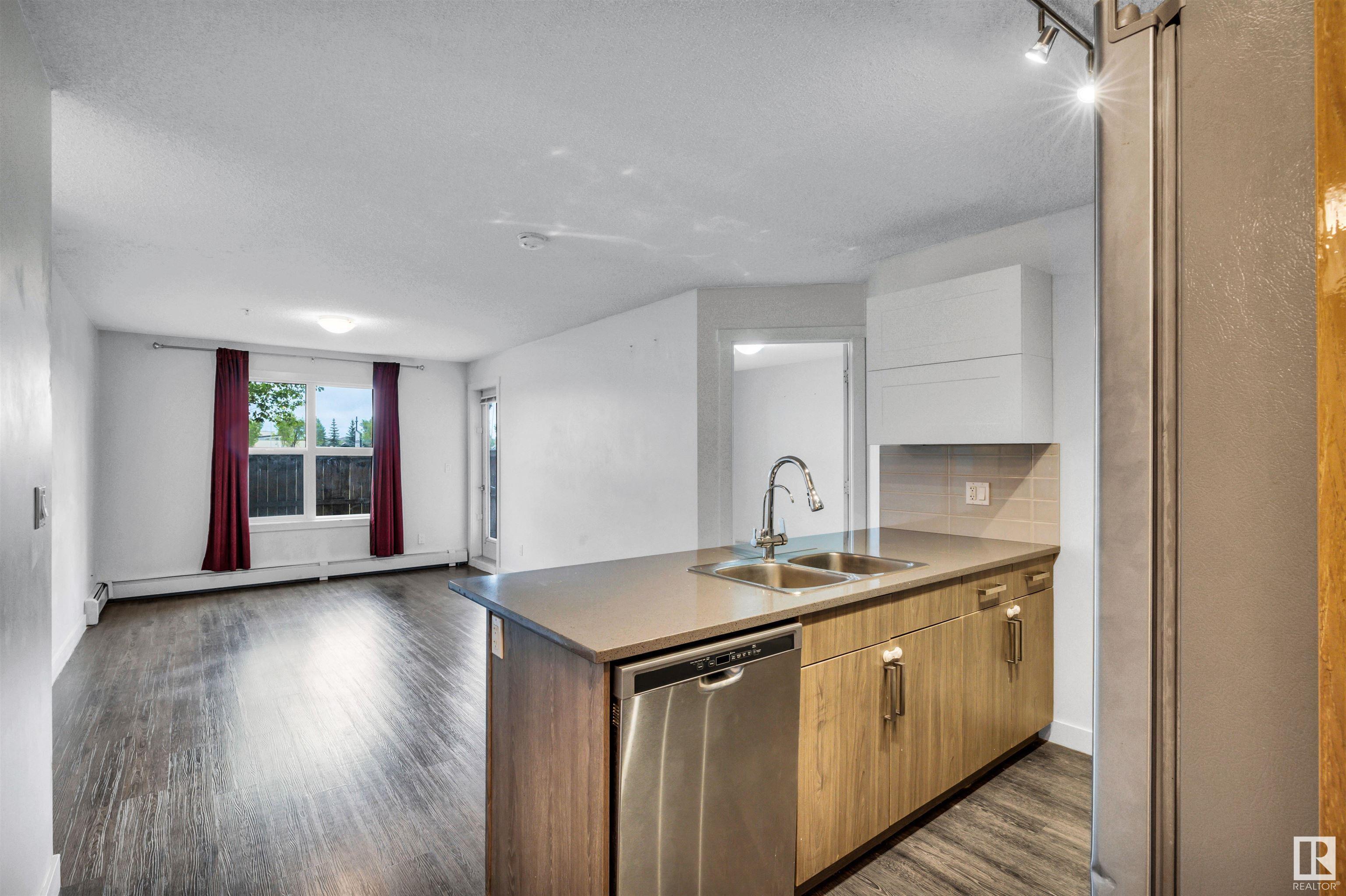 Property Photo: 667 Watt Boulevard SW 106 AB T6X 0Y2