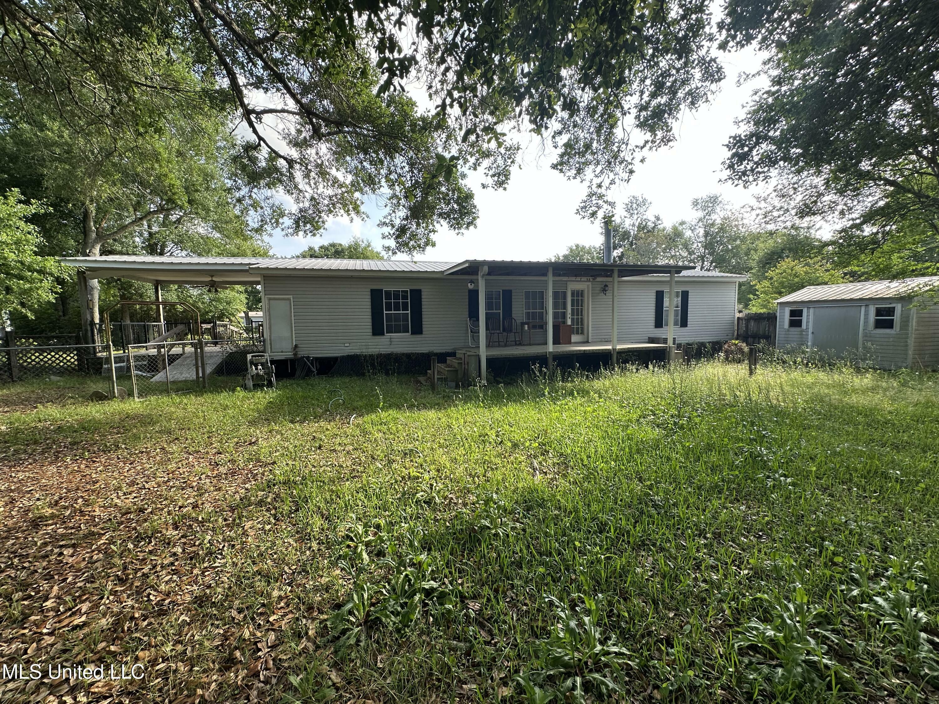 Property Photo: 18241 Robin Oaks Drive MS 39503