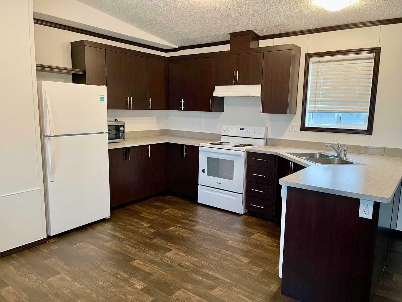 Photo de la propriété: 1609 14 Street 33 AB T9W 1K4