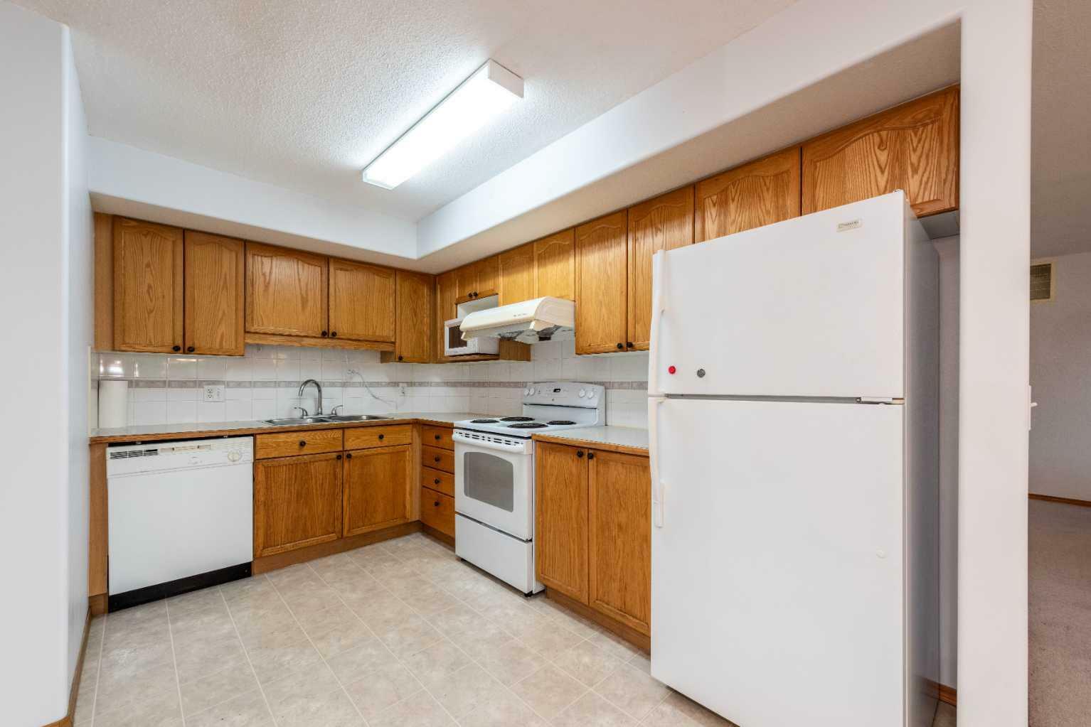 Property Photo:  6807 Pinecliff Grove NE  AB T1Y 7K8 